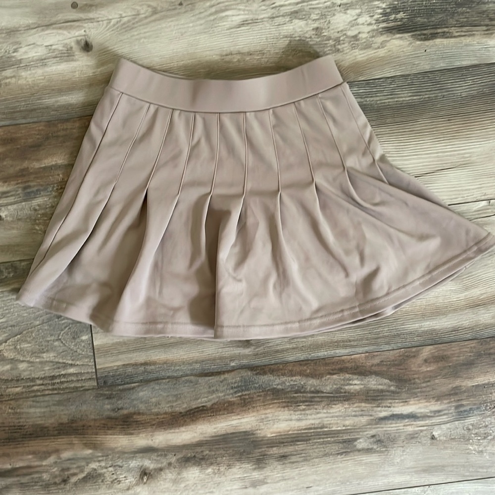 ⭐️3 FOR  $8⭐️ see shop for items!
Tan tennis skort